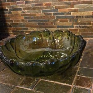 Vintage Indiana glass 3 toed bowl in sunflower pattern.